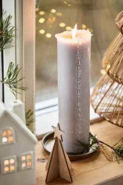 Kalenderlys 1–24 præget tal fra Ib Laursen